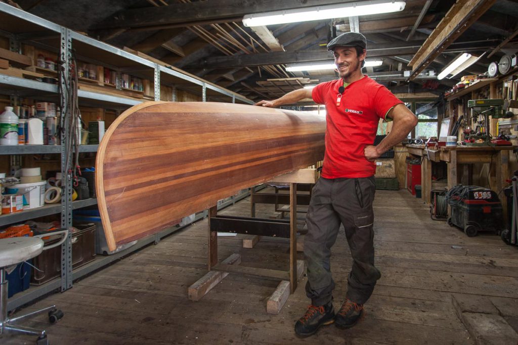 A wood strip canoe in need of revivification Johannes with his canoe A wood strip canoe in need of revivification