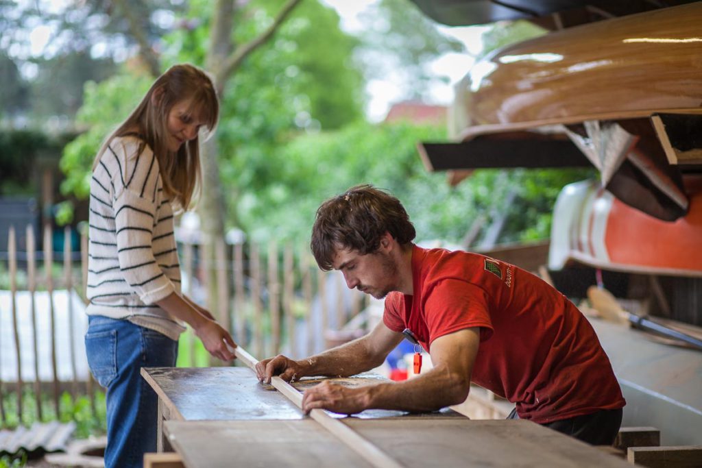 A wood strip canoe in need of revivification