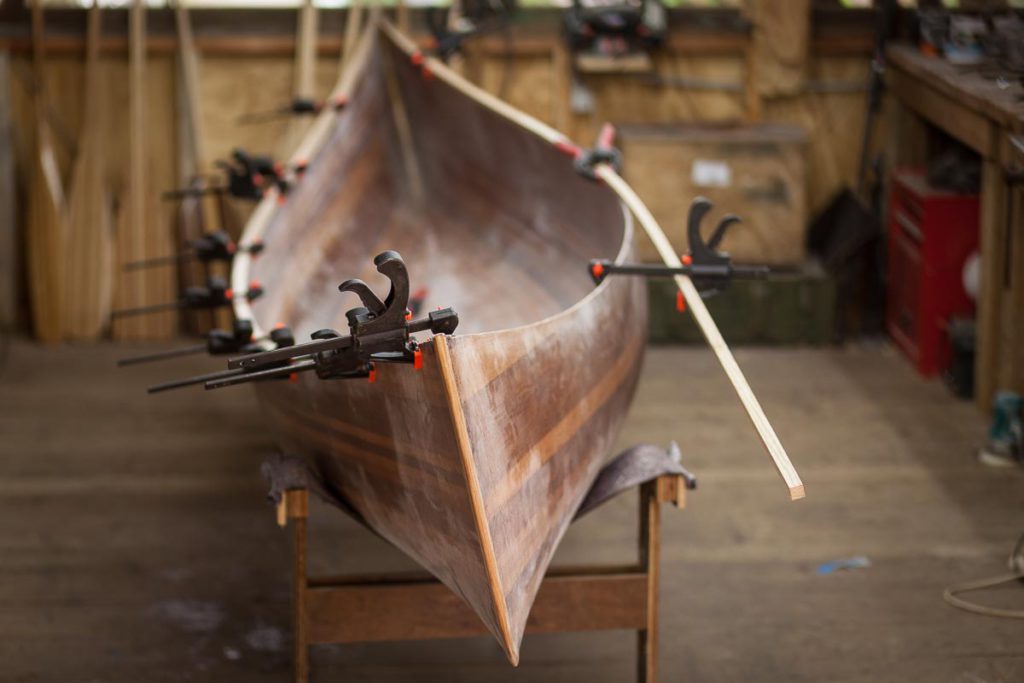 A wood strip canoe in need of revivification