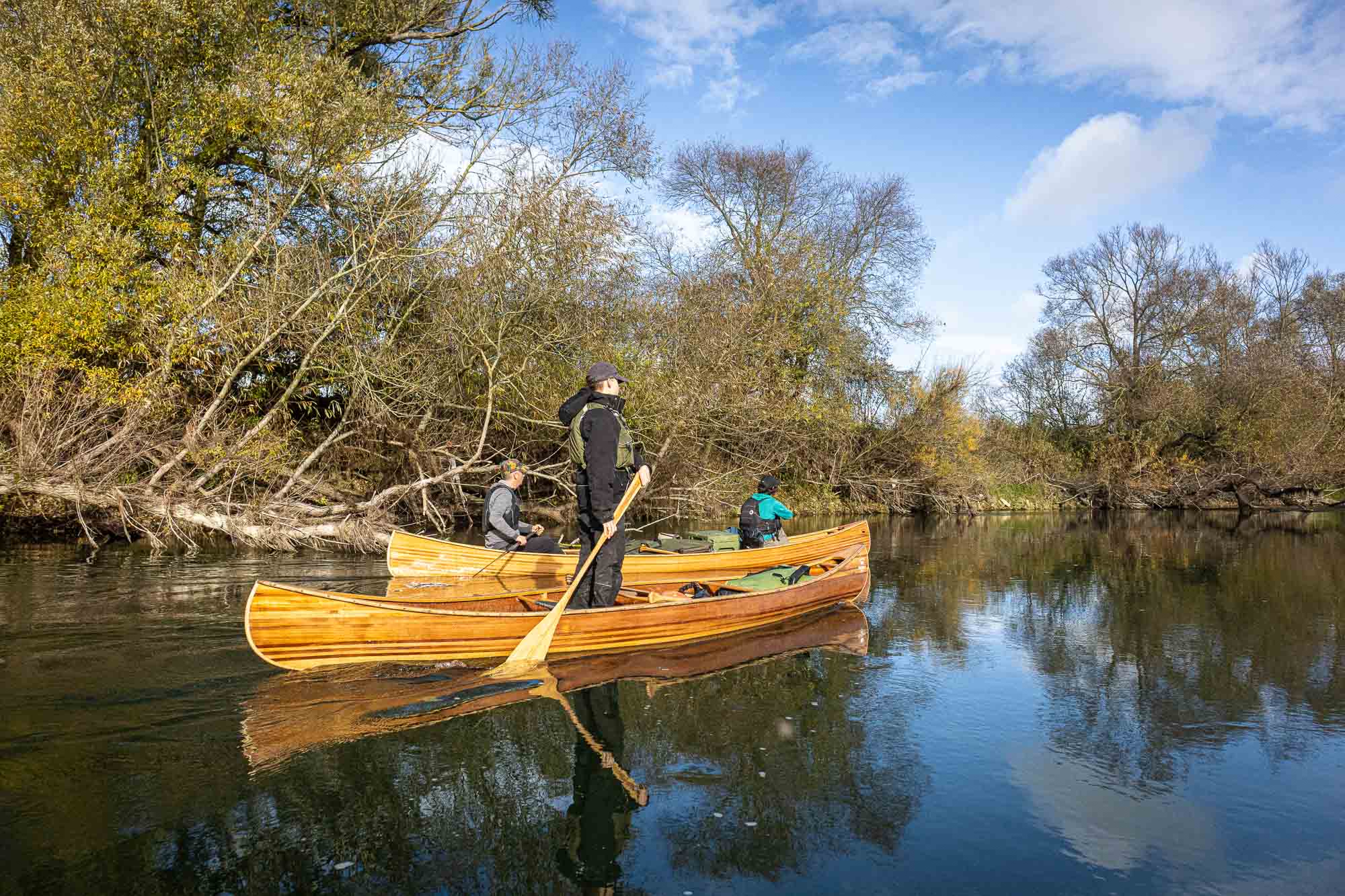 Mastering the art of canoeing standing uppaddling on the Meuse River